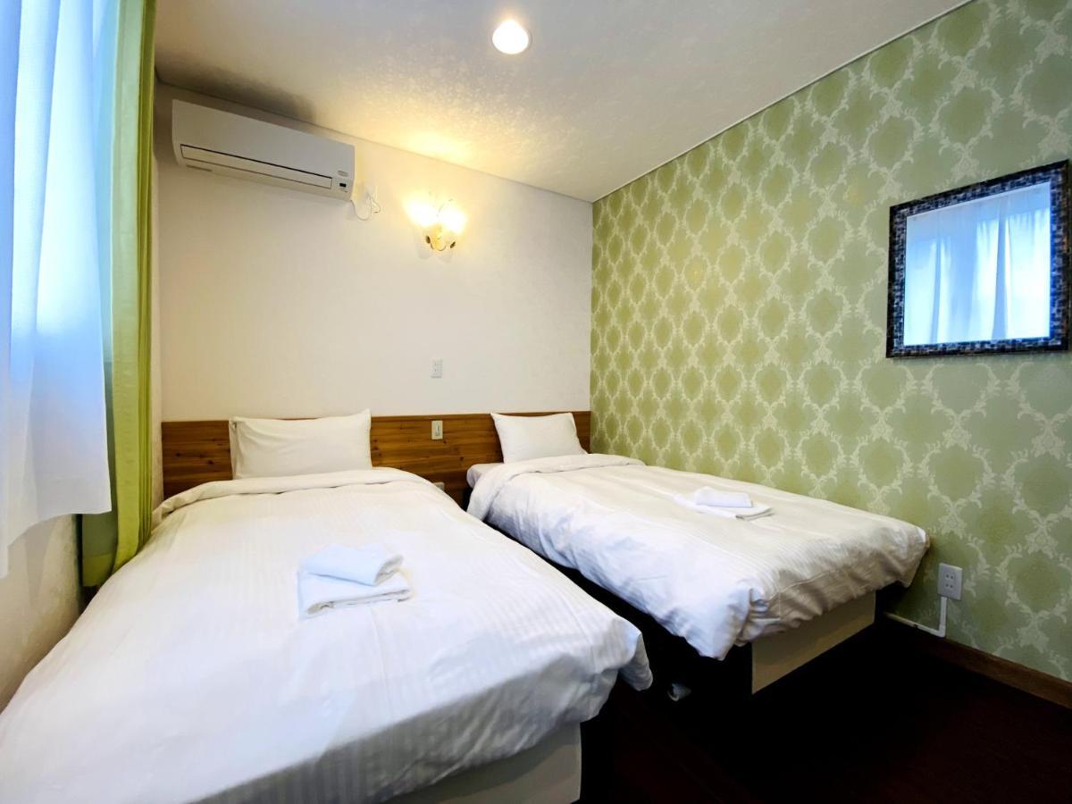 Petit Hotel Melon Furano Exterior photo