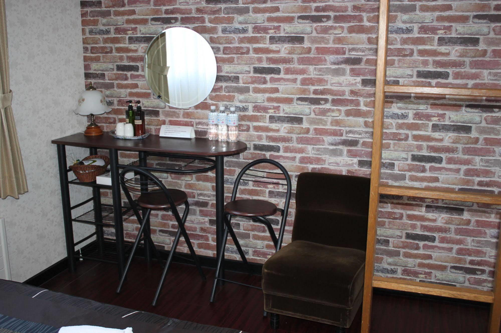 Petit Hotel Melon Furano Exterior photo